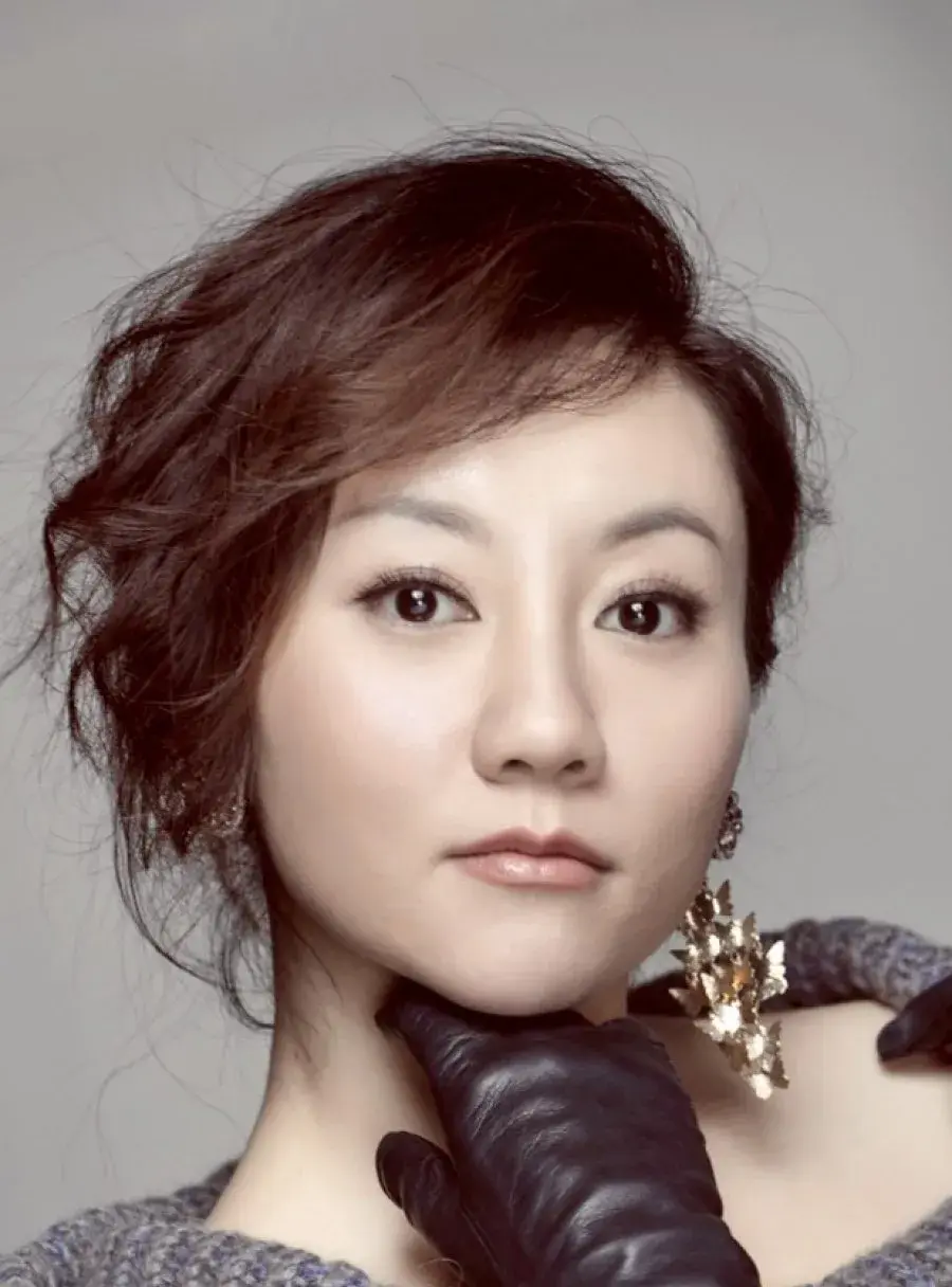 بیوگرافی Wang Qing