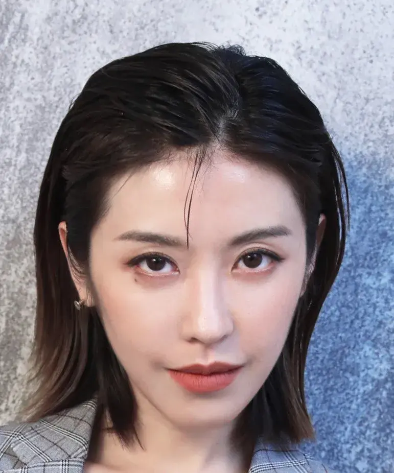 بیوگرافی Qiu En Dian