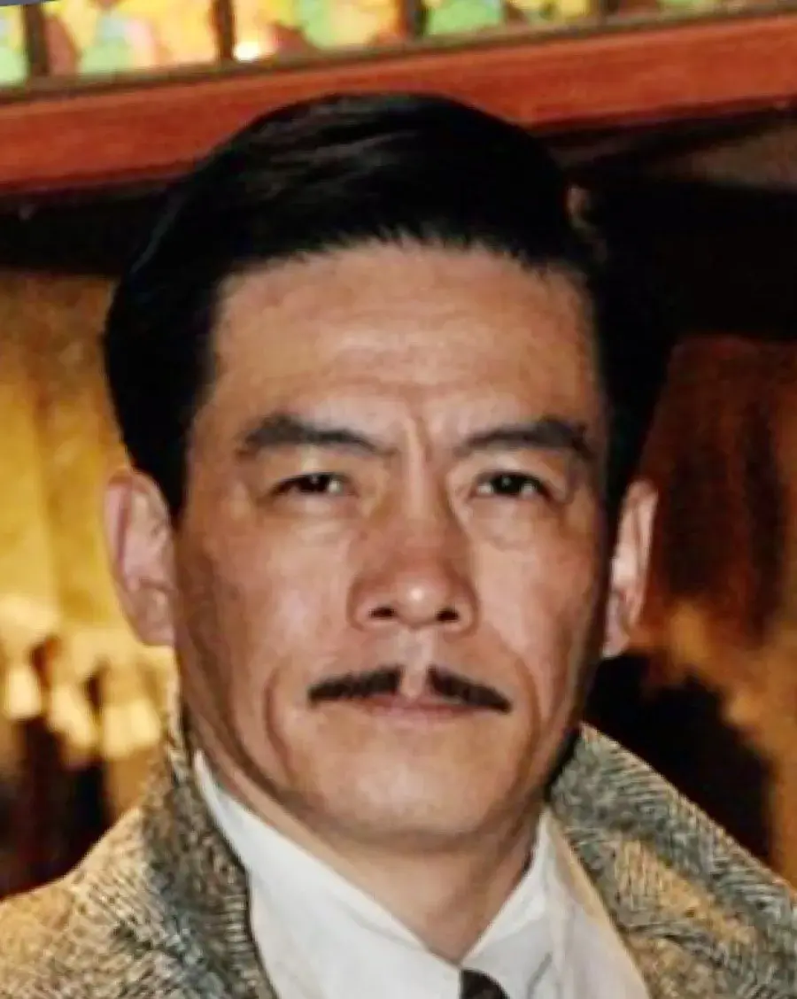 بیوگرافی Mi Xue Dong