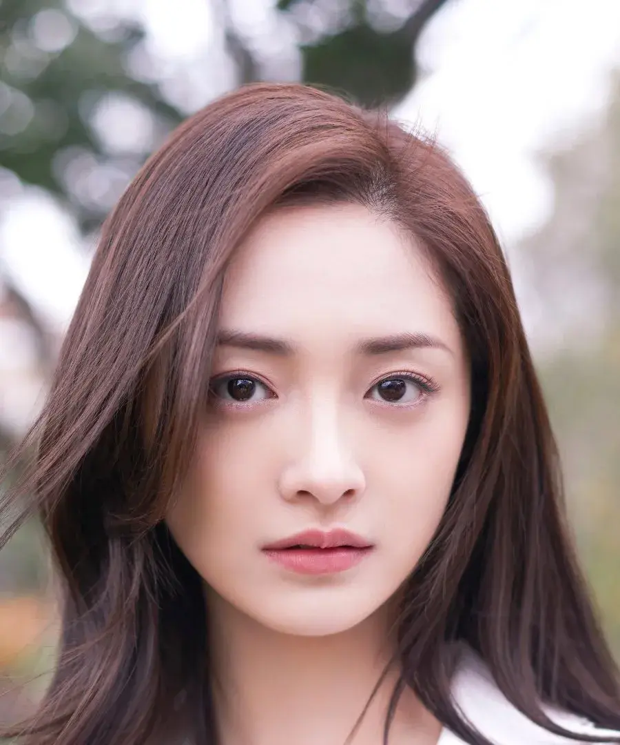 بیوگرافی Zhou Jie Qiong