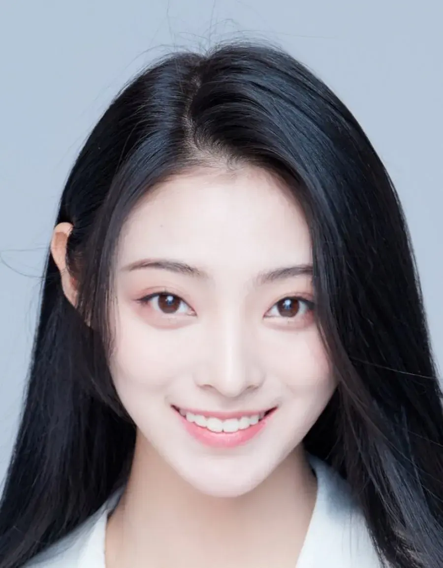 بیوگرافی Zhang Xin Tong
