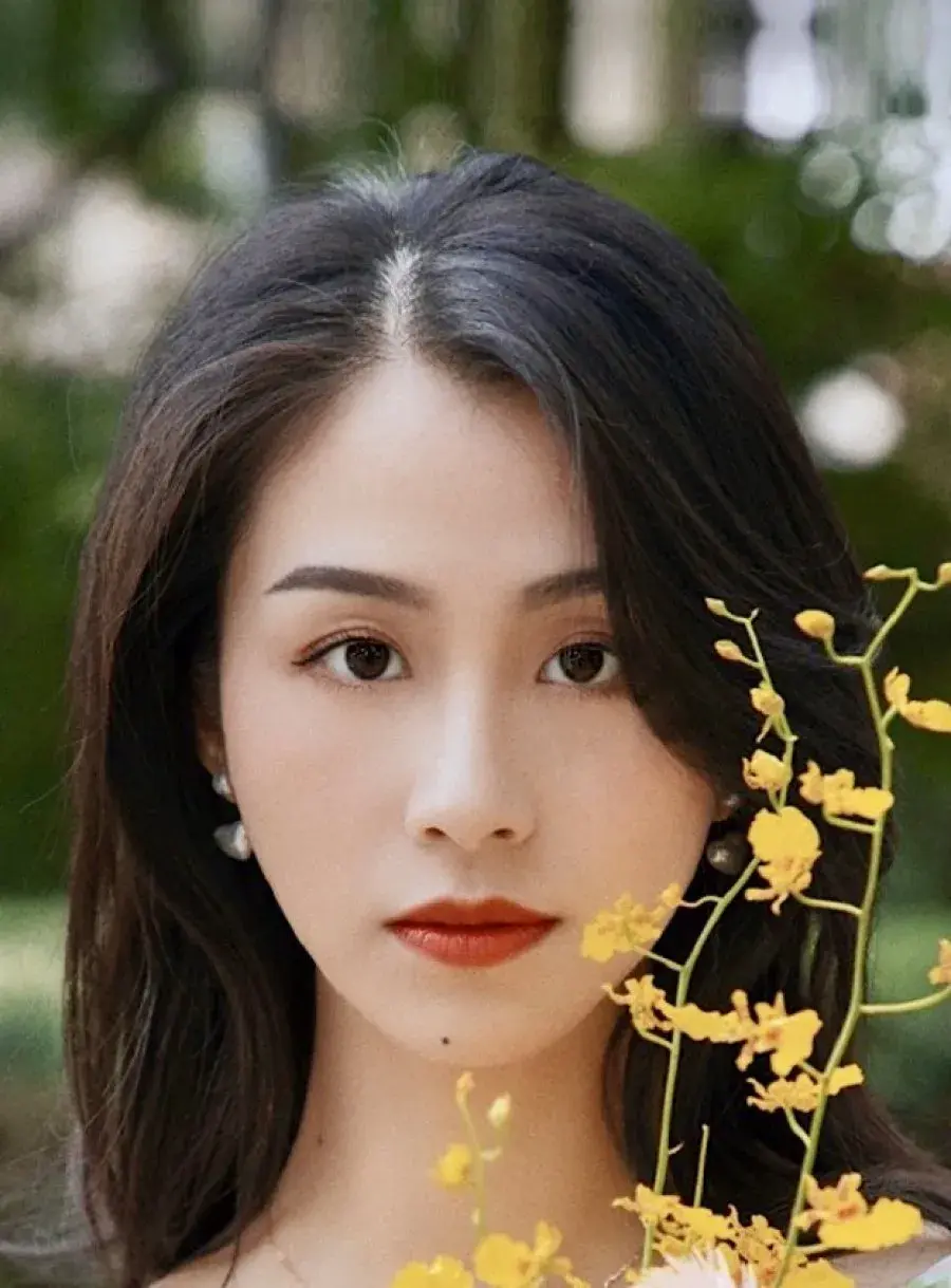بیوگرافی Yang Xi
