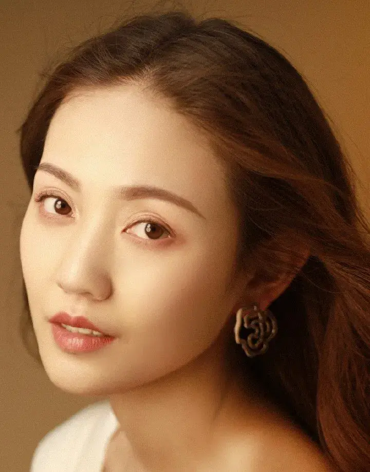 بیوگرافی Zhao Xin Tong