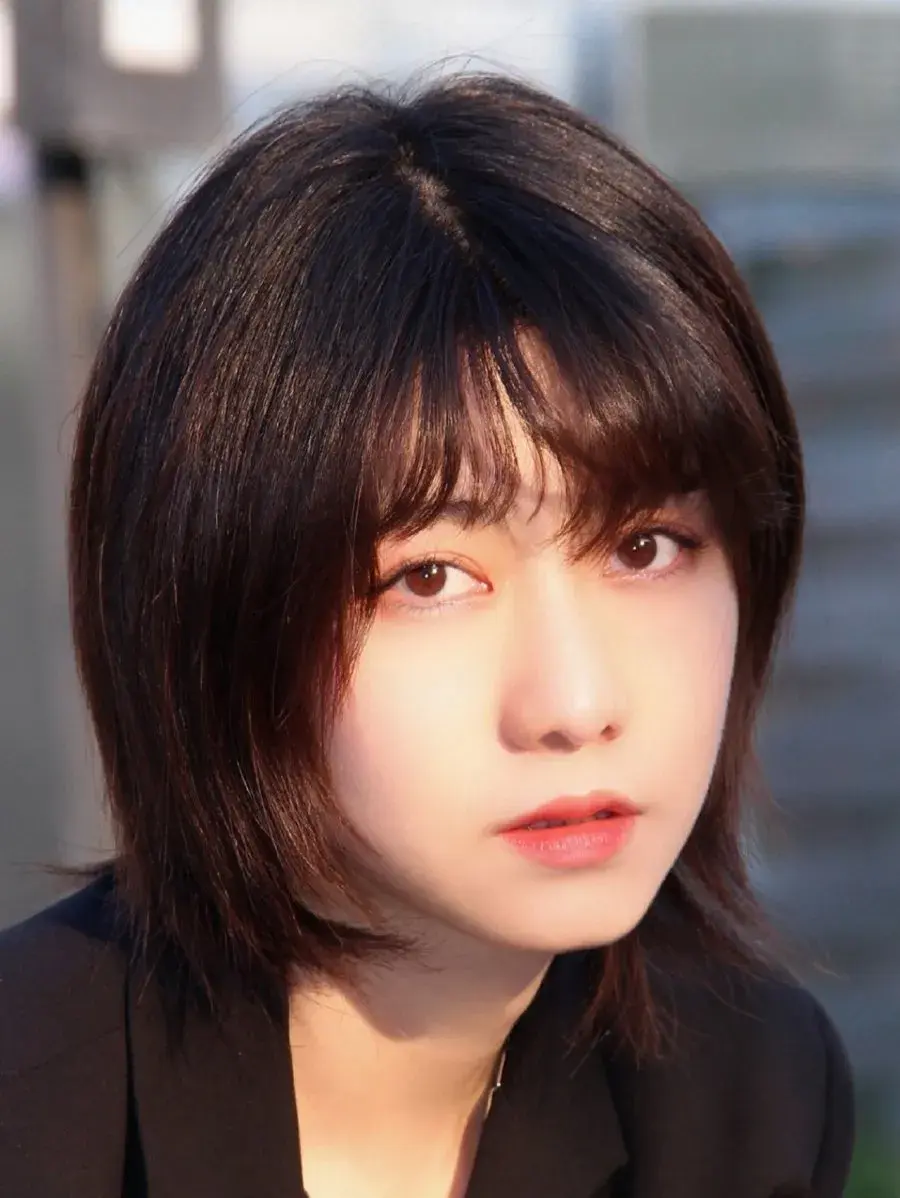 بیوگرافی Li Mi Er